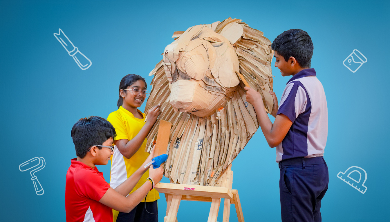 Students creating artwork with paints and various craft materials